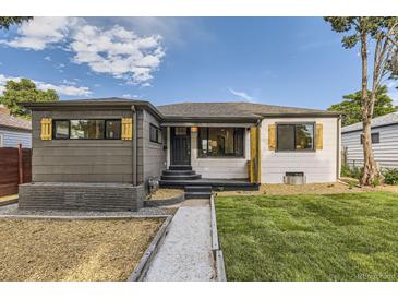Charming home featuring tasteful modern upgrades and a well-maintained lawn at 1640 Iola St, Aurora, CO 80010
