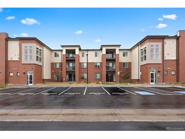 Modern building with brick and light siding and reserved parking available at 981 S Sable Blvd # 107, Aurora, CO 80012
