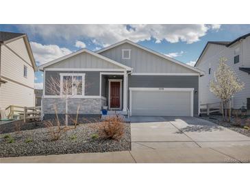 Charming single-Gathering home featuring a two-car garage and low maintenance front yard in a Gathering-friendly neighborhood at 2578 Gray Wolf Pl, Castle Rock, CO 80104