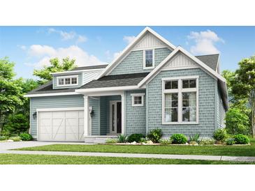 Charming craftsman-style home with blue siding, white trim, well-kept lawn, and a welcoming front porch at 1850 Hickory Ave, Erie, CO 80516
