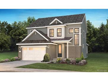 Charming two-story home with gray siding, a covered porch, manicured landscaping, and an attached two-car garage at 8892 Springsong Ln, Littleton, CO 80125