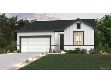 Charming home showcasing a two-car garage, lovely landscaping, and craftsman-style details at 4335 Gozzer Ranch Dr, Elizabeth, CO 80107