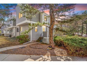 Charming two-story townhome with a well-maintained front yard and inviting entrance at 42 S Moline St, Aurora, CO 80012