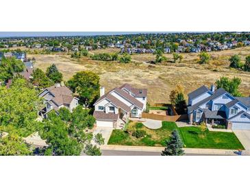 Spacious home with an oversized lot and a view of open space in a desirable neighborhood at 1743 Brookside Dr, Highlands Ranch, CO 80126