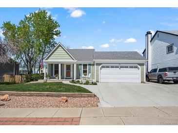 Charming single-Gathering home with a well-manicured lawn and an attached two-car garage in a great neighborhood at 803 W Lucerne Dr, Lafayette, CO 80026