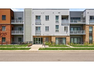 Modern condominium complex featuring sleek architectural design and well-maintained landscaping in a desirable location at 2525 Arapahoe St # Rd315, Denver, CO 80205