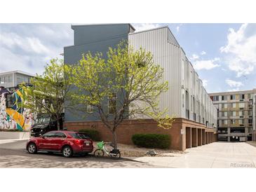 Contemporary condo building showcases unique architecture and parking at 2680 Blake St # 12, Denver, CO 80205
