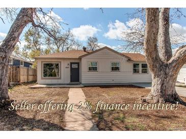 Charming single-story home with a well-maintained lawn and inviting front entrance at 1969 Uinta St, Denver, CO 80220