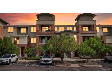 Beautiful condo building with modern architecture and sunset view at 4100 Albion St # 424, Denver, CO 80216