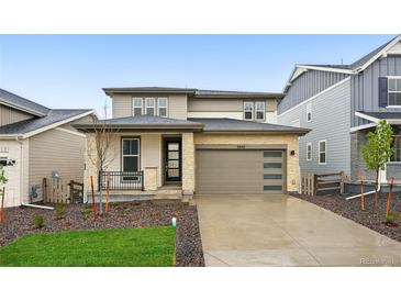 Beautiful two-story home with a stone-accented facade and a well-maintained front yard at 8840 Whiteclover St, Littleton, CO 80125