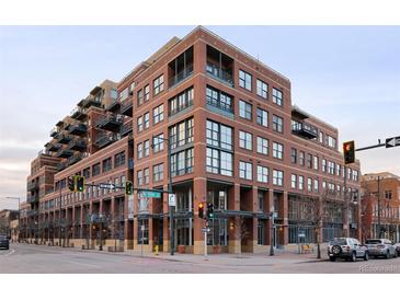 Beautiful brick building in the city with balconies and large windows offers urban living at its finest at 1499 Blake St # 6A, Denver, CO 80202