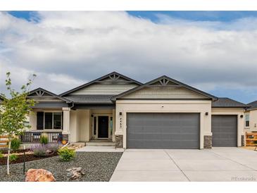 Charming single Gathering home with a three car garage and beautiful landscaping at 4465 Mesa Top Dr, Monument, CO 80132