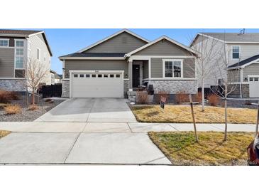 Charming single-Gathering home with a two-car garage and well-maintained front lawn at 226 S Shady Grove Ct, Aurora, CO 80018