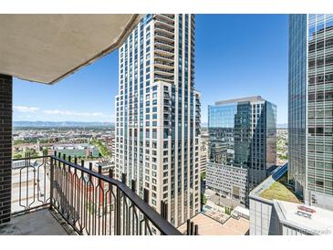 Stunning city views from the balcony of a high-rise condo, showcasing the cityscape and modern architecture at 1020 15Th St # 25D, Denver, CO 80202