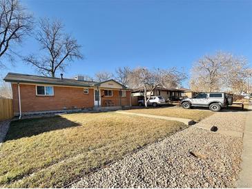 Ranch style home with mature trees and a spacious yard at 7505 Clay St, Westminster, CO 80030