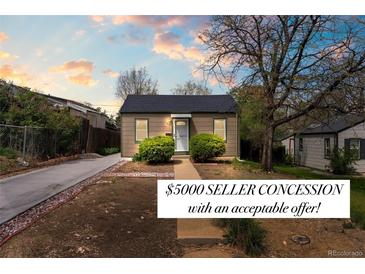 Charming single-story home with a well-maintained yard and inviting entryway at 661 Tennyson St, Denver, CO 80204