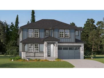 Charming two-story home featuring stone accents, a covered porch, and an attached two-car garage at 10727 Snowdon St, Parker, CO 80134