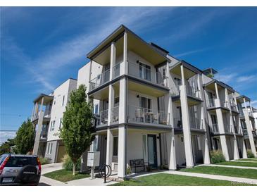 Contemporary three-story condo building featuring private balconies and modern architectural details at 2197 S Clermont St, Denver, CO 80222