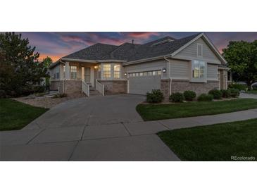 Beautiful single-Gathering home with well-maintained landscaping and an attached two-car garage at 8258 S Sicily Ct, Aurora, CO 80016