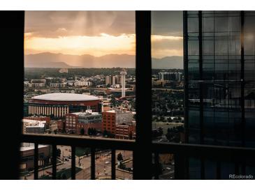 Stunning city view overlooking the skyline and mountains from a modern high-rise window at 1133 14Th St # 2110, Denver, CO 80202