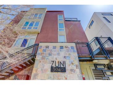 Stylish, multi-story building with modern architecture and a unique Zuni 3040 address plaque at 3040 Zuni St # F, Denver, CO 80211