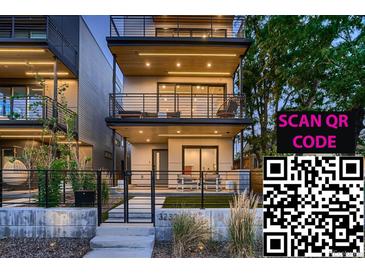 Modern three-story home featuring multiple balconies and sleek design with a gated front yard and modern lighting at 3232 W 16 Ave, Denver, CO 80204