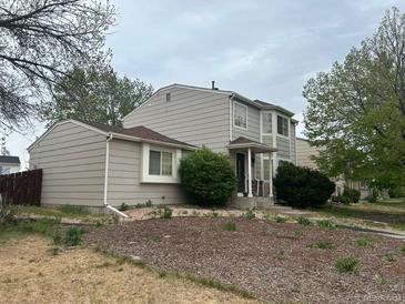 Charming two-story home with well-maintained landscaping at 4320 Nepal St, Denver, CO 80249
