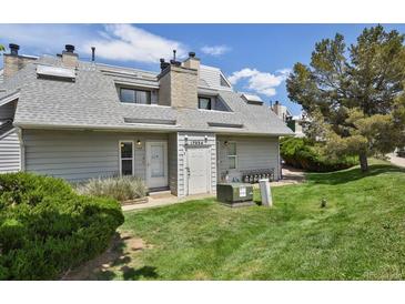 Charming townhouse with well-maintained lawn and easy access at 17034 E Tennessee Dr # 106, Aurora, CO 80017