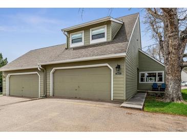 Charming home featuring a 2-car garage, well-maintained landscaping, and traditional architectural design at 10474 W Purgatoire Peak, Littleton, CO 80127