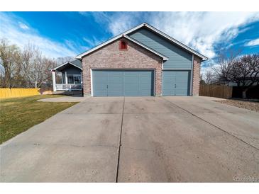 This property has a two-car garage with an extra space for parking on the side, enough for all your vehicles at 5283 E 131St Dr, Thornton, CO 80241