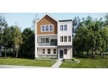 New construction two-story home featuring white siding, brown accents, balcony, and manicured lawn at 7246 Waterleaf Trl, Littleton, CO 80125