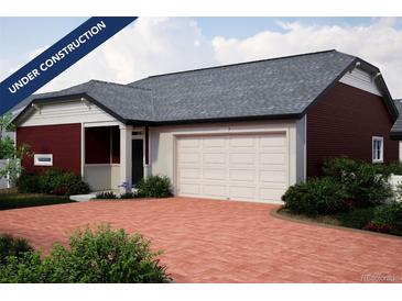 New home exterior with brick driveway, two-car garage and covered porch; home is currently under construction at 21915 E 51St Dr, Aurora, CO 80019
