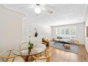 Cozy living room with hardwood floors, ample natural light, and stylish decor at 2047 S Milwaukee St # 4, Denver, CO 80210