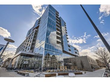 Modern building featuring a reflective glass exterior and unique architectural design at 4200 W 17Th Ave # 1013, Denver, CO 80204
