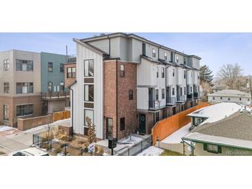 Charming new townhome with brick accents and modern architectural details in a desirable neighborhood at 5423 S Prince St # B, Littleton, CO 80120