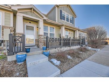Charming townhome with a welcoming front porch and well-maintained landscaping details at 3751 W 136Th Ave # P3, Broomfield, CO 80023