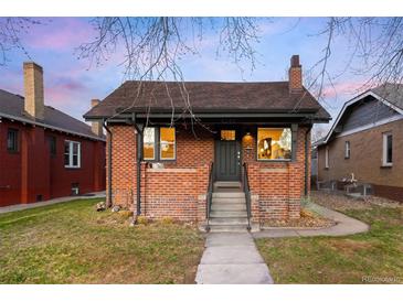 Charming brick home with well-maintained lawn and inviting entrance at 4344 Wyandot St, Denver, CO 80211