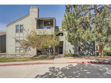 Inviting two-story condo with charming balcony and mature trees at 14130 E Temple Dr # T01, Aurora, CO 80015