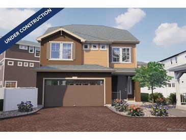 Two story home with a two car garage and landscaping, property is under construction at 1176 Sugarloaf Ln, Erie, CO 80516