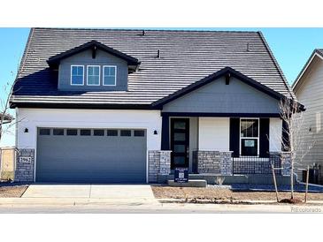 Two-story Craftsman home with gray siding, white accents, and a two-car garage at 2962 Newfound Lake Rd, Berthoud, CO 80513