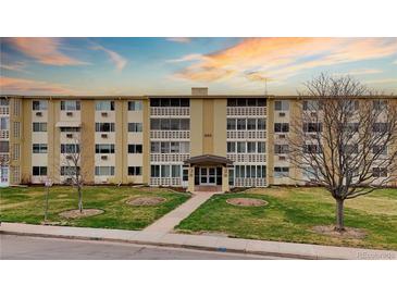 Charming condo building boasts manicured lawn and inviting entrance at 660 S Alton Way # 12C, Denver, CO 80247