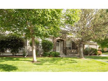 Charming home featuring a well-maintained lawn and mature trees in a peaceful neighborhood at 12790 Jackson St, Thornton, CO 80241