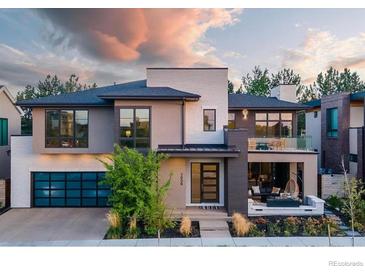 Stunning two-story home with modern design and landscaped yard at 7036 E Archer Pl, Denver, CO 80230