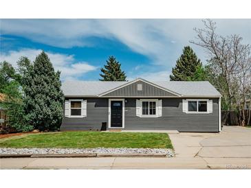 Charming single-story home with a well-manicured front yard and inviting entrance at 5108 S Pennsylvania St, Littleton, CO 80121
