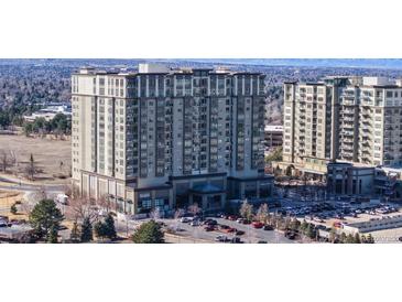 Contemporary high-rise condo building featuring modern architecture and a landscaped surrounding in an urban setting at 7600 Landmark Way # 613-2, Greenwood Village, CO 80111