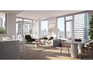 Bright open-concept living room featuring floor to ceiling windows and stylish modern furniture at 525 18Th St # 1702, Denver, CO 80202