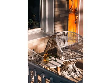 Cozy front porch with seating and a decorative orange door, perfect for relaxing evenings at 3746 Jason St, Denver, CO 80211