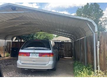 Car parked under sturdy metal carport structure at 5040 Tennyson St, Denver, CO 80212