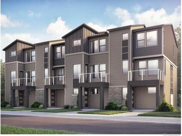 Modern townhome exteriors feature multi-toned siding, stone accents, balconies, and well-maintained landscaping at 2668 W 68Th Ave, Denver, CO 80221