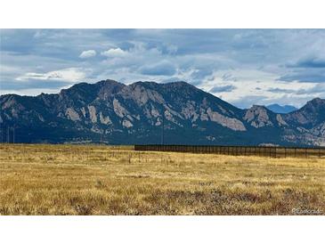 Picturesque land with mountain views and an open field, perfect for building a dream home in a serene setting at 1747 High Plains Ct, Superior, CO 80027